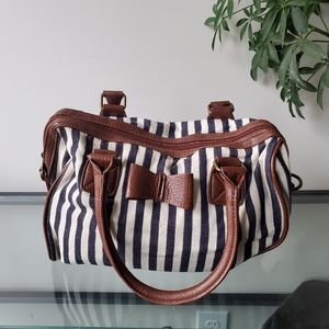 Navy and white striped purse with leather details